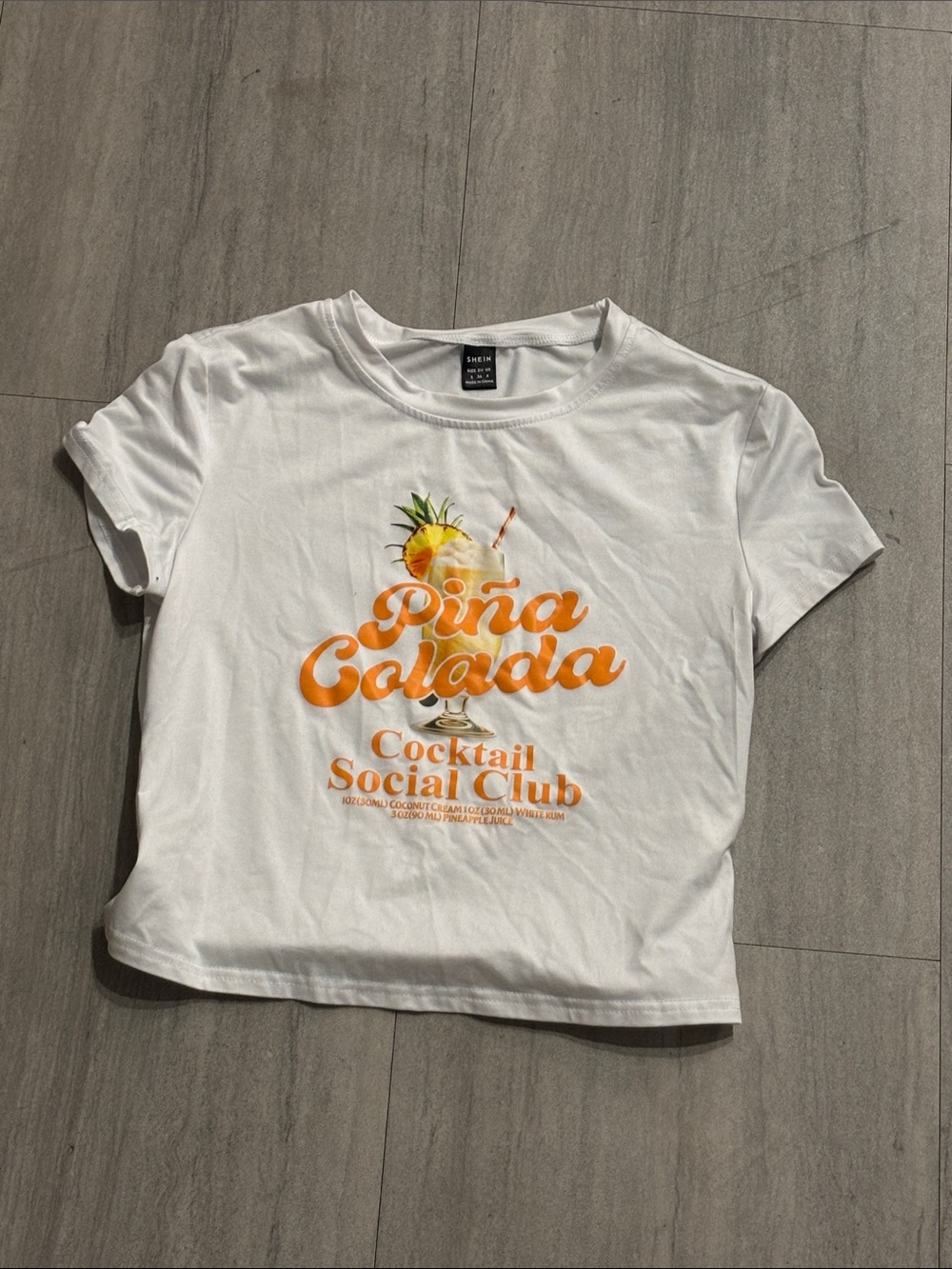 SHEIN White Crop Tee with Orange Piña Colada Graphic